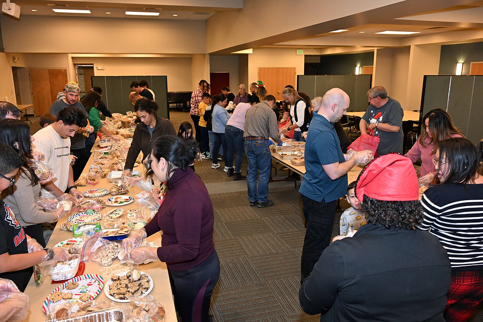 A group of people at a cookie exchange