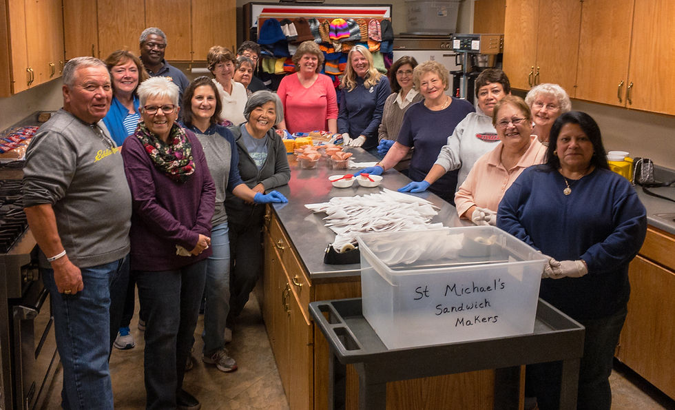 A group of women making sandwiches at a church